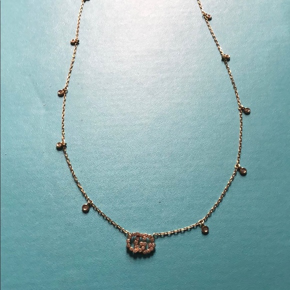 Gucci running diamond necklace in yellow gold.